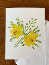 Load image into Gallery viewer, Card with yellow floral design on a wooden surface