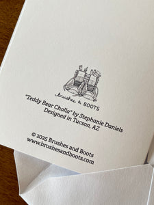 Back of card with the text "Teddy Bear Cholla" by Stephanie Daniels, Designed in Tucson, AZ